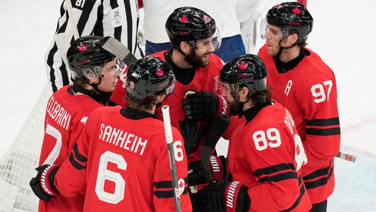 Canada's Tom Wilson (43) celebrates after scoring a goal during a preliminary round game between Canada and France at the 2026 Winter Olympics, in Milan, Italy, Sunday, Feb. 15, 2026. (AP Photo/Hassan Ammar)