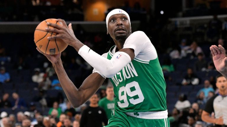 Boston Celtics forward Chris Boucher looks to shoot in the second half of an NBA basketball preseason game against the Memphis Grizzlies, Wednesday, Oct. 8, 2025, in Memphis, Tenn. (AP Photo/Brandon Dill)