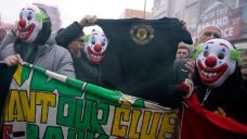 Man United fans wear clown masks in latest protest at club’s owners