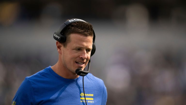 Los Angeles Rams offensive coordinator Mike LaFleur communicates on a Sony headphones during an NFL pre-season football game against the Dallas Cowboys, Saturday, Aug. 9, 2025, in Inglewood, Calif. (AP Photo/Kyusung Gong)