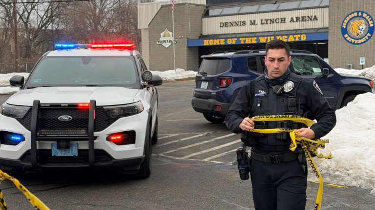 Police continue to tape off the Dennis M. Lynch arena a day after a deadly shooting during a youth hockey game on Tuesday, Feb. 17, 2026 in Pawtucket, R.I. (AP Photo/Rodrique Ngowi)