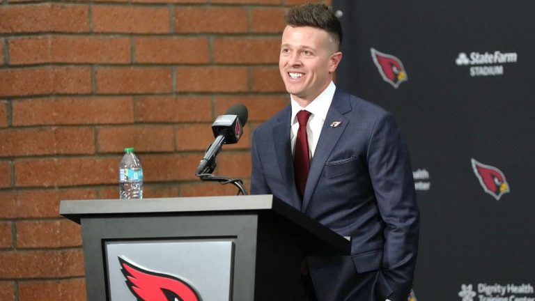 Arizona Cardinals new head coach Mike LaFleur acknowledges the media after being introduced during an NFL football news conference, Tuesday, Feb. 3, 2026, in Tempe, Ariz. (AP Photo/Rick Scuteri)