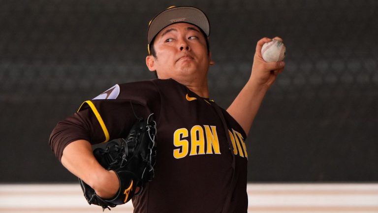 San Diego Padres pitcher Yuki Matsui throws during spring training baseball practice Monday, Feb. 16, 2026, in Peoria, Ariz. (AP Photo/Charlie Riedel)