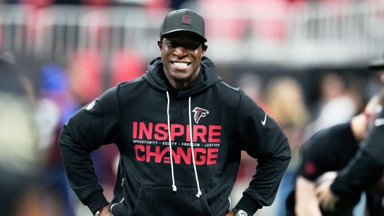 Atlanta Falcons head coach Raheem Morris stands on the field before an NFL football game against the New Orleans Saints, Sunday, Jan. 4, 2026, in Atlanta. (AP Photo/Brynn Anderson)