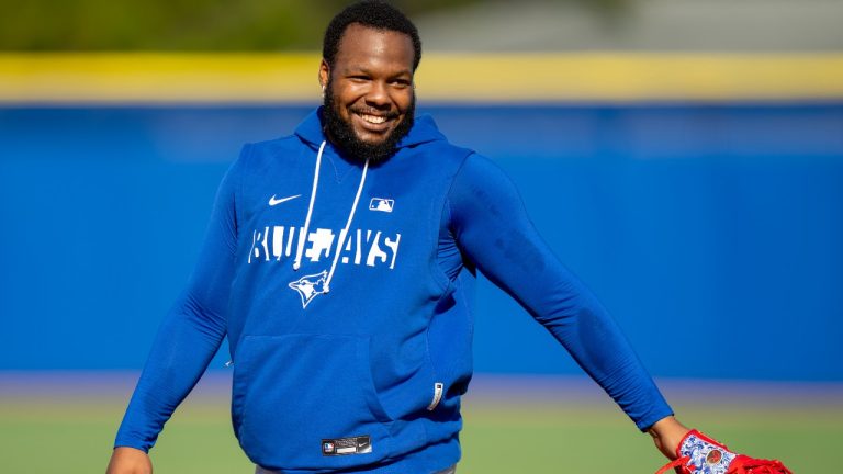 Toronto Blue Jays' Vladimir Guerrero Jr. lets out a smile during fielding drills at Spring Training in Dunedin, Fla., on Monday, Feb. 16, 2026. (Frank Gunn/CP)