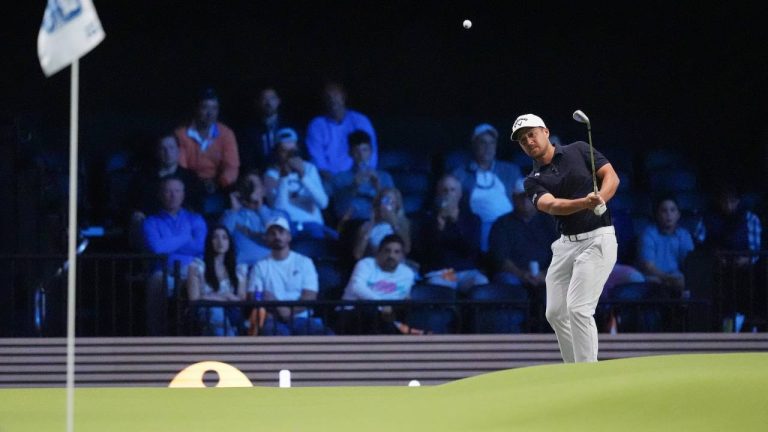 Xander Schauffele of New York Golf Club watches his shot on the green on the 12th hole during the inaugural match of the TMRW Golf League, against The Bay Golf Club, Tuesday, Jan. 7, 2025, in Palm Beach Gardens, Fla. (Rebecca Blackwell/AP)