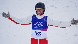 Canada's Emile Nadeau celebrates during the men's freestyle skiing aerials qualifications at the 2026 Winter Olympics, in Livigno, Italy, Friday, Feb. 20, 2026. (Abbie Parr/AP Photo)