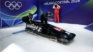 Canada's Cynthia Appiah, front right, starts for a two women bobsled training session at the 2026 Winter Olympics, in Cortina d'Ampezzo, Italy, Wednesday, Feb. 18, 2026. (Aijaz Rahi/AP Photo)