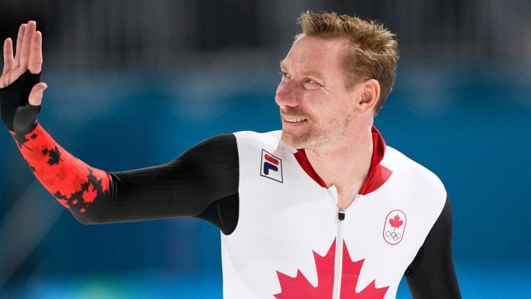 Ted-Jan Bloemen of Canada greets fans prior to competing in the men's 5,000 meters speedskating race at the 2026 Winter Olympics, in Milan, Italy, Sunday, Feb. 8, 2026. (Ben Curtis/AP Photo)