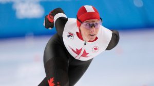 Ivanie Blondin of Canada competes in the women's 1500 metres speedskating race at the 2026 Winter Olympics, in Milan, Italy, Friday, Feb. 20, 2026. (Ben Curtis/AP Photo)