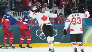 Mark Stone (61) of Team Canada celebrates a goal with Mitch Marner (93) against Team Czechia during second period men's Olympic hockey action at the 2026 Milan Cortina Winter Olympics in Milan, Italy on Thursday, February 12, 2026. (Nathan Denette/CP)