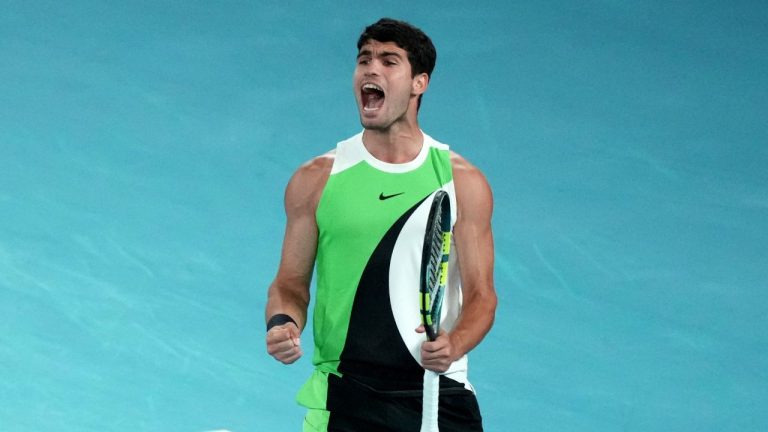 Carlos Alcaraz of Spain reacts during the men's singles final match against Novak Djokovic of Serbia at the Australian Open tennis championship in Melbourne, Australia, Sunday, Feb. 1, 2026.(Mark Baker/AP)