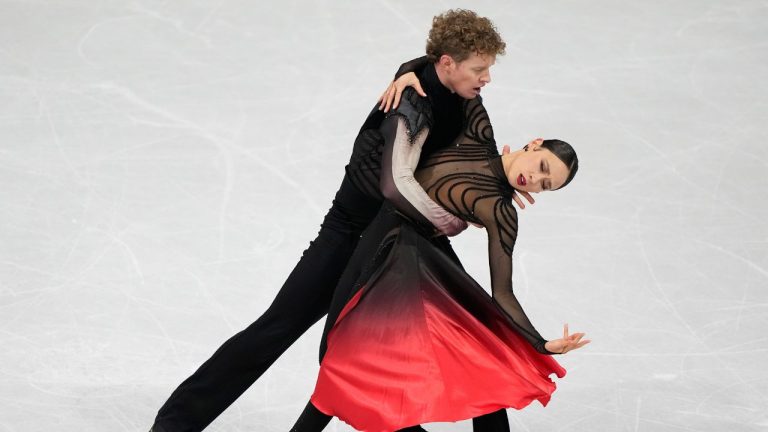 Madison Chock and Evan Bates of the United States compete during the ice dancing free skate in figure skating at the 2026 Winter Olympics, in Milan, Italy, Wednesday, Feb. 11, 2026. (Natacha Pisarenko/AP Photo)