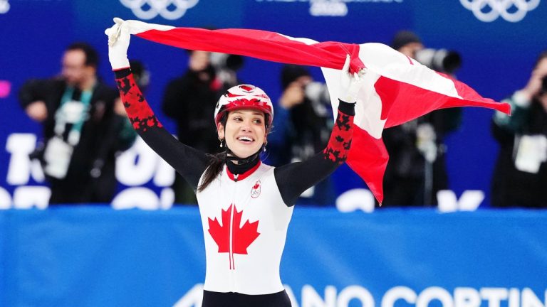 Team Canada’s Courtney Sarault celebrates a silver medal in women's 1000m Short Track Speed Skating at the Milano Cortina 2026 Olympic Winter Games in Milan, Monday, Feb. 16, 2026. (Leah Hennel/COC/Handout/CP)