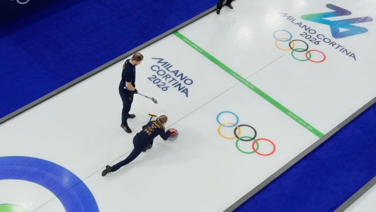 Sweden's Rasmus & Isabella Wranaa compete during a curling mixed doubles session at the 2026 Winter Olympics in Cortina d'Ampezzo, Italy, Wednesday, Feb. 4, 2026. (David J. Phillip/AP Photo)