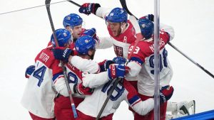 Team Czechia players celebrate after a goal by Ondrej Palat (18) during the third period of a men's ice hockey quarterfinal game at the 2026 Winter Olympics, in Milan, Italy, Wednesday, Feb. 18, 2026. (Carolyn Kaster/AP)