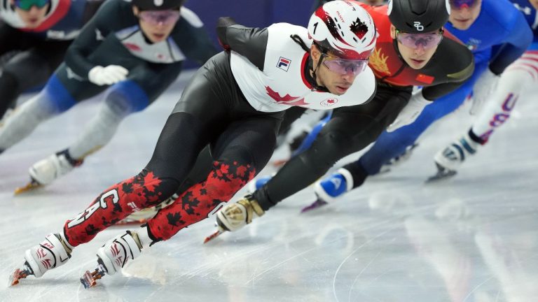 Canada's William Dandjinou competes in the Men's semifinal 1500m Short Track Speed Skating event during the 2026 Milan Cortina Winter Olympics in Milan, Italy on Saturday, February 14, 2026. (Nathan Denette/THE CANADIAN PRESS)