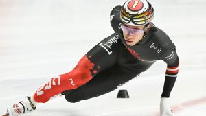 William Dandjinou of Canada skates during the 500m quarterfinal race at the ISU Short Track World Tour speedskating event in Montreal, Saturday, Oct. 11, 2025. (Graham Hughes/THE CANADIAN PRESS)