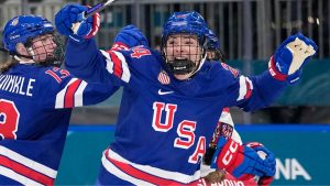 United States' Joy Dunne, right, celebrates after scoring her sides second goal during a preliminary round match of women's ice hockey between United States and Czechia at the 2026 Winter Olympics, in Milan, Italy, Thursday, Feb. 5, 2026. (Petr David Josek/AP Photo)