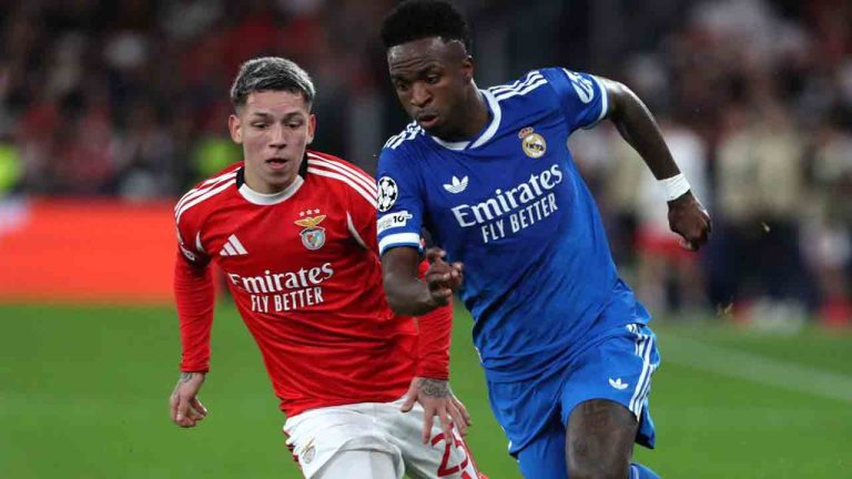 Benfica's Gianluca Prestianni fights for the ball against Real Madrid's Vinicius Junior during a Champions League playoff soccer match between SL Benfica and Real Madrid in Lisbon, Portugal, Tuesday, Feb. 17, 2026. (Pedro Rocha/AP)