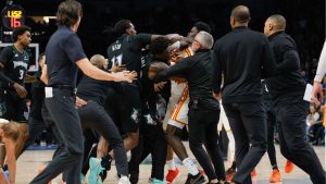 Minnesota Timberwolves centre Naz Reid gets in a fight with Atlanta Hawks forward Mouhamed Gueye during the second half of an NBA basketball game, Monday, Feb. 9, 2026, in Minneapolis. (Bailey Hillesheim/AP)