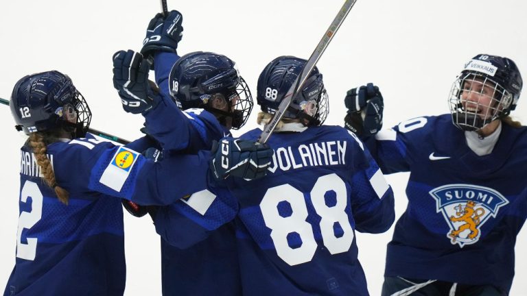 Finland players celebrate during the bronze medal match between Czech Republic and Finland at the Women's Ice Hockey Championships in Ceske Budejovice, Czech Republic, Sunday, April 20, 2025. (Petr David Josek/AP Photo)