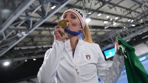 Francesca Lollobrigida of Italy kisses her gold medal after the women's 3,000 meters speedskating race at the 2026 Winter Olympics, in Milan, Italy, Saturday, Feb. 7, 2026. (Christophe Ena/AP)
