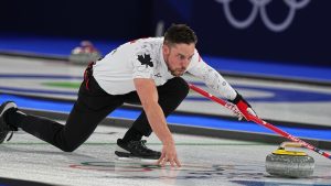 Canada's Brett Gallant in action during the mixed doubles round robin phase of the curling competition against Norway, at the 2026 Winter Olympics, in Cortina d'Ampezzo, Italy, Thursday, Feb. 5, 2026. (Fatima Shbair/AP Photo)