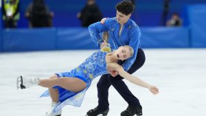 Piper Gilles and Paul Poirier of Team Canada compete in the Figure Skating Ice Dance Free Dance competition during the 2026 Milan Cortina Winter Olympics in Milan, Italy on Wednesday, Feb. 11, 2026. (Nathan Denette/CP)