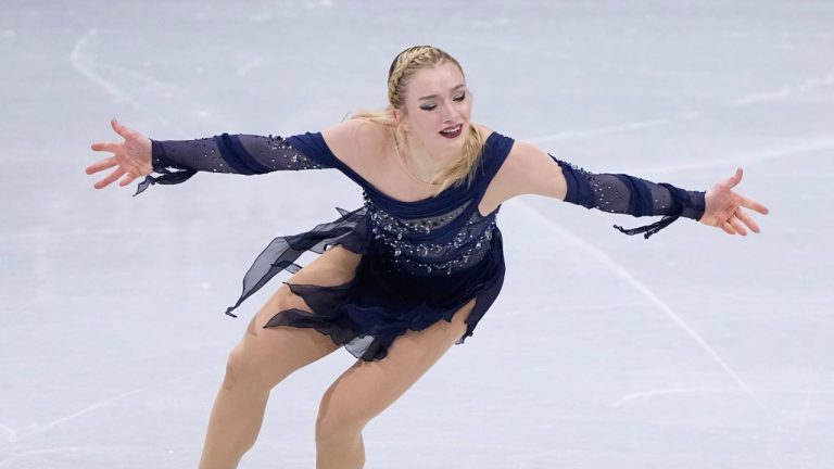 Amber Glenn of the United States competes during the figure skating women's team event at the 2026 Winter Olympics, in Milan, Italy, Sunday, Feb. 8, 2026. (Natacha Pisarenko/AP Photo)