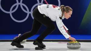 Canada's Rachel Homan in action during the women's curling round robin session against Sweden, at the 2026 Winter Olympics, in Cortina d'Ampezzo, Italy, Tuesday, Feb. 17, 2026. (Misper Apawu/AP Photo)