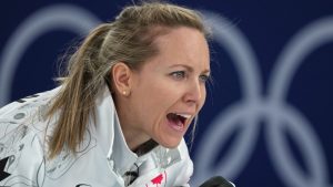 Canada's Rachel Homan gestures, during the women's curling round robin session against Sweden, at the 2026 Winter Olympics, in Cortina d'Ampezzo, Italy, Tuesday, Feb. 17, 2026. (AP Photo/Misper Apawu)