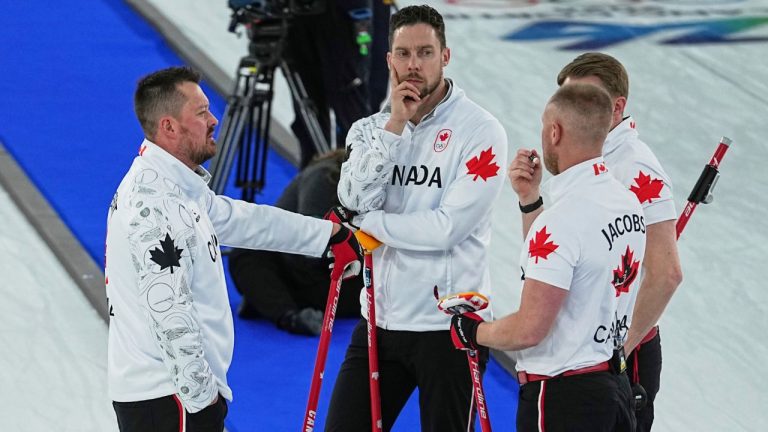 Canada's Ben Hebert, Brett Gallant, Brad Jacobs, and Marc Kennedy strategize during the men's curling round robin session against Switzerland at the 2026 Winter Olympics, in Cortina d'Ampezzo, Italy, Saturday, Feb. 14, 2026. (Fatima Shbair/AP Photo)