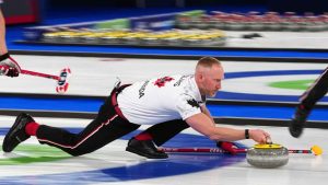 Canada's Brad Jacobs competes during a men's curling gold medal match between Britain and Canada, at the 2026 Winter Olympics, in Cortina d'Ampezzo. (Misper Apawu/AP)