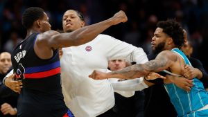 Detroit Pistons centre Jalen Duren, left, throws punches with Charlotte Hornets forward Miles Bridges, right, during a fight on the court in the second half of an NBA basketball game in Charlotte, N.C., Monday, Feb. 9, 2026. (Nell Redmond/AP)