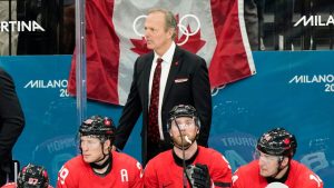 Canada head coach Jon Cooper watches play against the United States during the third period of the men's ice hockey gold medal game at the 2026 Winter Olympics, in Milan, Italy, Sunday, Feb. 22, 2026. (Luca Bruno/AP)