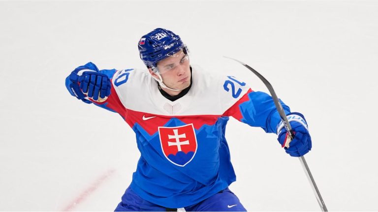 Slovakia's Juraj Slafkovsky celebrates after scoring during a preliminary round match of men's ice hockey between Slovakia and Finland at the 2026 Winter Olympics, in Milan, Italy, Wednesday, Feb. 11, 2026. (Petr David Josek/AP)