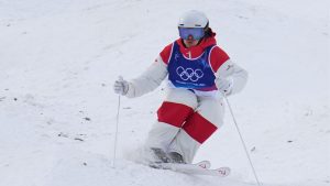 Canada's Mikael Kingsbury competes during the men's freestyle skiing moguls finals at the 2026 Winter Olympics, in Livigno, Italy, Thursday, Feb. 12, 2026. (Gregory Bull/AP Photo)