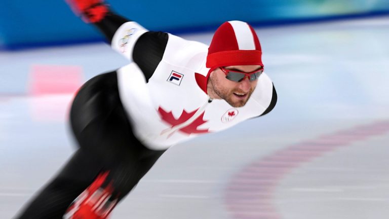 Laurent Dubreuil of Canada competes in the men's 1,000 meters speedskating race at the 2026 Winter Olympics, in Milan, Italy, Wednesday, Feb. 11, 2026. (Ben Curtis/AP Photo)