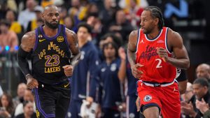 Los Angeles Lakers forward LeBron James, left, and Los Angeles Clippers forward Kawhi Leonard up court during the first half of an NBA basketball game Thursday, Jan. 22, 2026, in Inglewood, Calif. (Mark J. Terrill/AP)