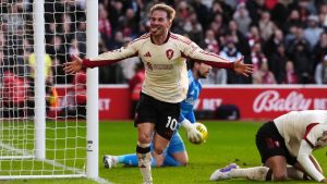 Liverpool's Alexis Mac Allister celebrates scoring during the English Premier League soccer match between Nottingham Forest and Liverpool in Nottingham, England, Sunday Feb. 22, 2026. (Nick Potts/PA via AP)
