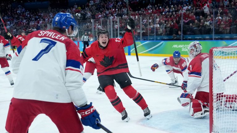 Canada's Macklin Celebrini (17) celebrates his goal against Czechia goalie Lukas Dostal (1) during the first period of a quarterfinal men's hockey game at the 2026 Winter Olympics, in Milan, on Wednesday, Feb. 18, 2026. (Darryl Dyck/CP)