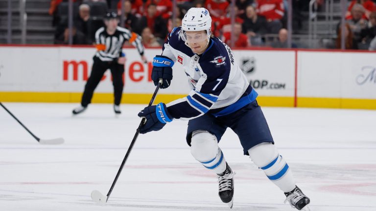 Winnipeg Jets centre Vladislav Namestnikov (7) moves the puck up the ice against the Detroit Red Wings during the first period of an NHL hockey game Wednesday, Dec. 31, 2025, in Detroit. (Duane Burleson/AP)