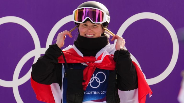Megan Oldham, of Canada, reacts after winning the bronze medal in the women's freeski slopestyle final at the Milano Cortina 2026 Winter Olympic Games in Livigno, Italy on Monday, Feb. 9, 2026. (Sean Kilpatrick/THE CANADIAN PRESS)