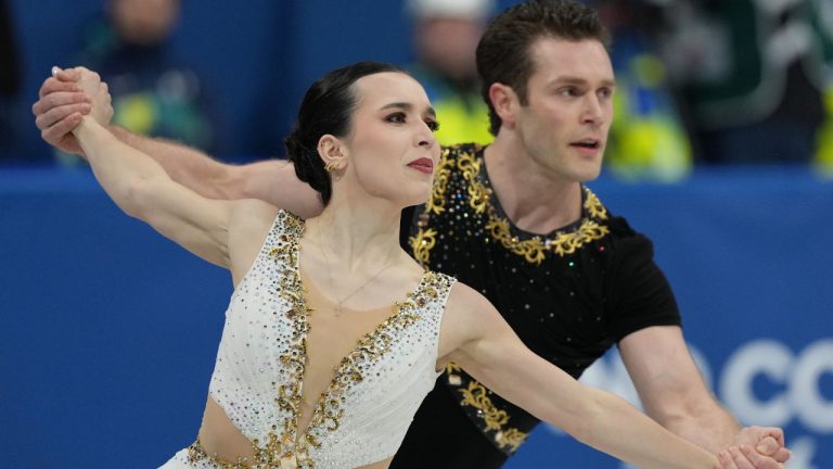 Lia Pereira and Trennt Michaud of Canada compete during the pairs figure skating long program at the 2026 Winter Olympics, in Milan, Italy, Monday, Feb. 16, 2026. (Stephanie Scarbrough/AP Photo)