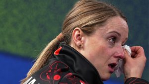 Canada's Jocelyn Peterman cries during the mixed doubles round robin phase of the curling competition against Sweden, at the 2026 Winter Olympics, in Cortina d'Ampezzo, Italy, Sunday, Feb. 8, 2026. (Fatima Shbair/AP Photo)