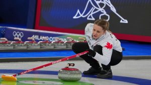 Canada's Jocelyn Peterman in action during the mixed doubles round robin phase of the curling competition against Norway at the 2026 Winter Olympics, in Cortina d'Ampezzo, Italy, Thursday, Feb. 5, 2026. (Misper Apawu/AP Photo)