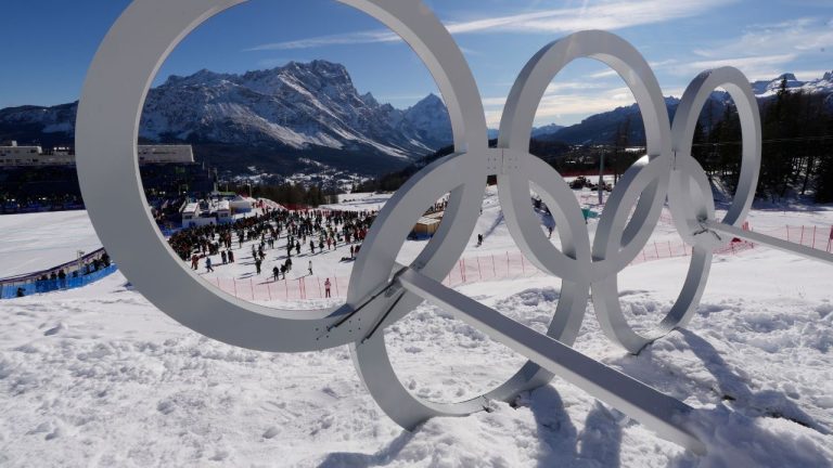 Olympic rings are seen ahead of an alpine ski women's downhill race, at the 2026 Winter Olympics, in Cortina d'Ampezzo, Italy, Sunday, Feb. 8, 2026. (Robert F. Bukaty/AP Photo)