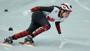 Canada's Courtney Sarault competes in the women's 500 meter short track speed skating at the 2026 Winter Olympics, in Milan, Italy, Tuesday, Feb. 10, 2026. (Darryl Dyck/THE CANADIAN PRESS)