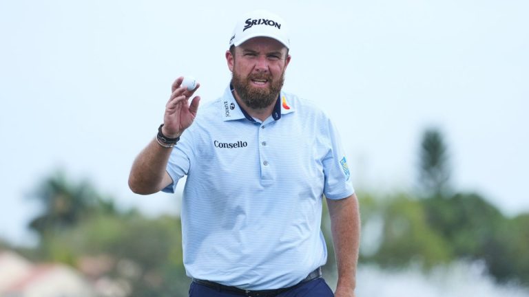 Shane Lowry of Ireland shows his ball on the 18th green during the third round of the Cognizant Classic golf tournament, Saturday, Feb. 28, 2026, in Palm Beach Gardens, Fla. (Marta Lavandier/AP)